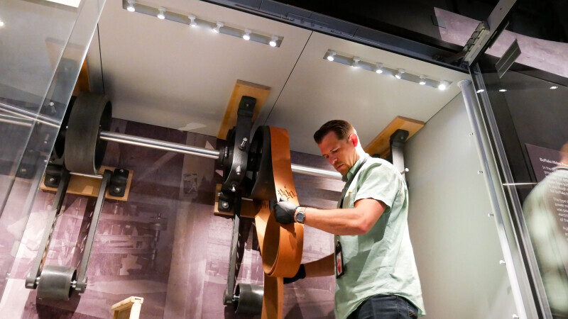 Man conducts museum maintenance at Gateway Arch National Park