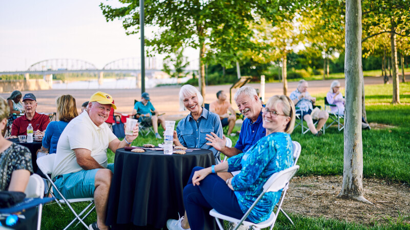 Guests enjoying the Blues at the Arch Member Tent 2022