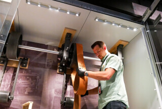 Man conducts museum maintendance