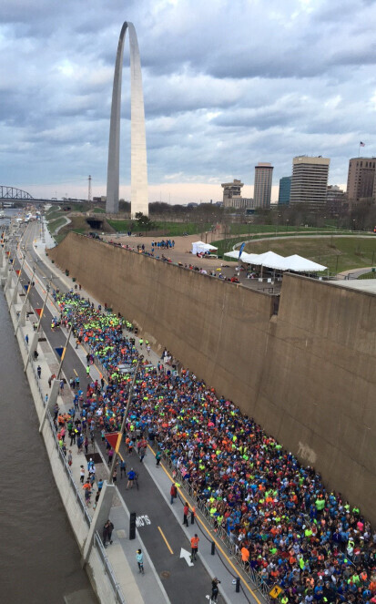 People walk along the Riverfront