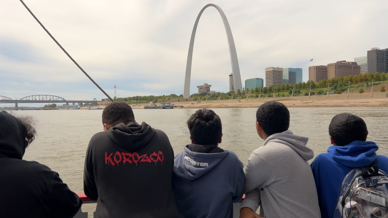 Journey Fund group in 2022, looking at Gateway Arch from riverboat