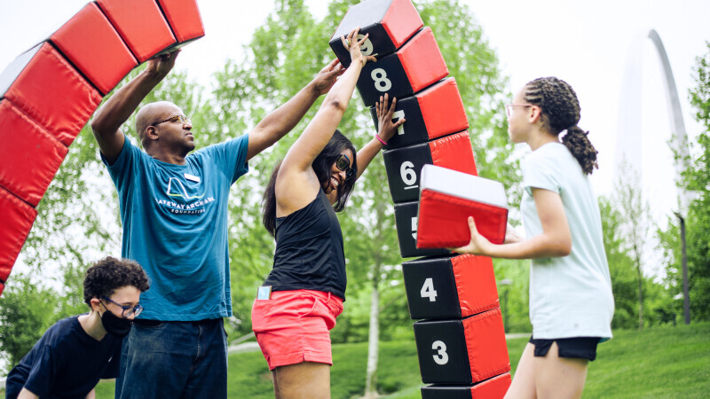 Family building foam arch at Picnic in your Park